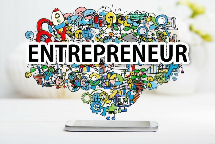 Entrepreneur concept with smartphone on white table